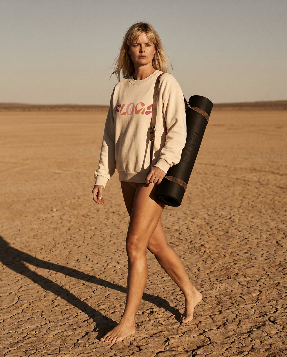 The Floga sweatshirt worn on a dry lake bed