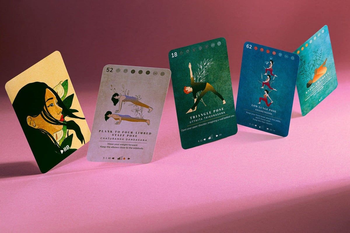 A yoga practice laid out with cards, away from any screen