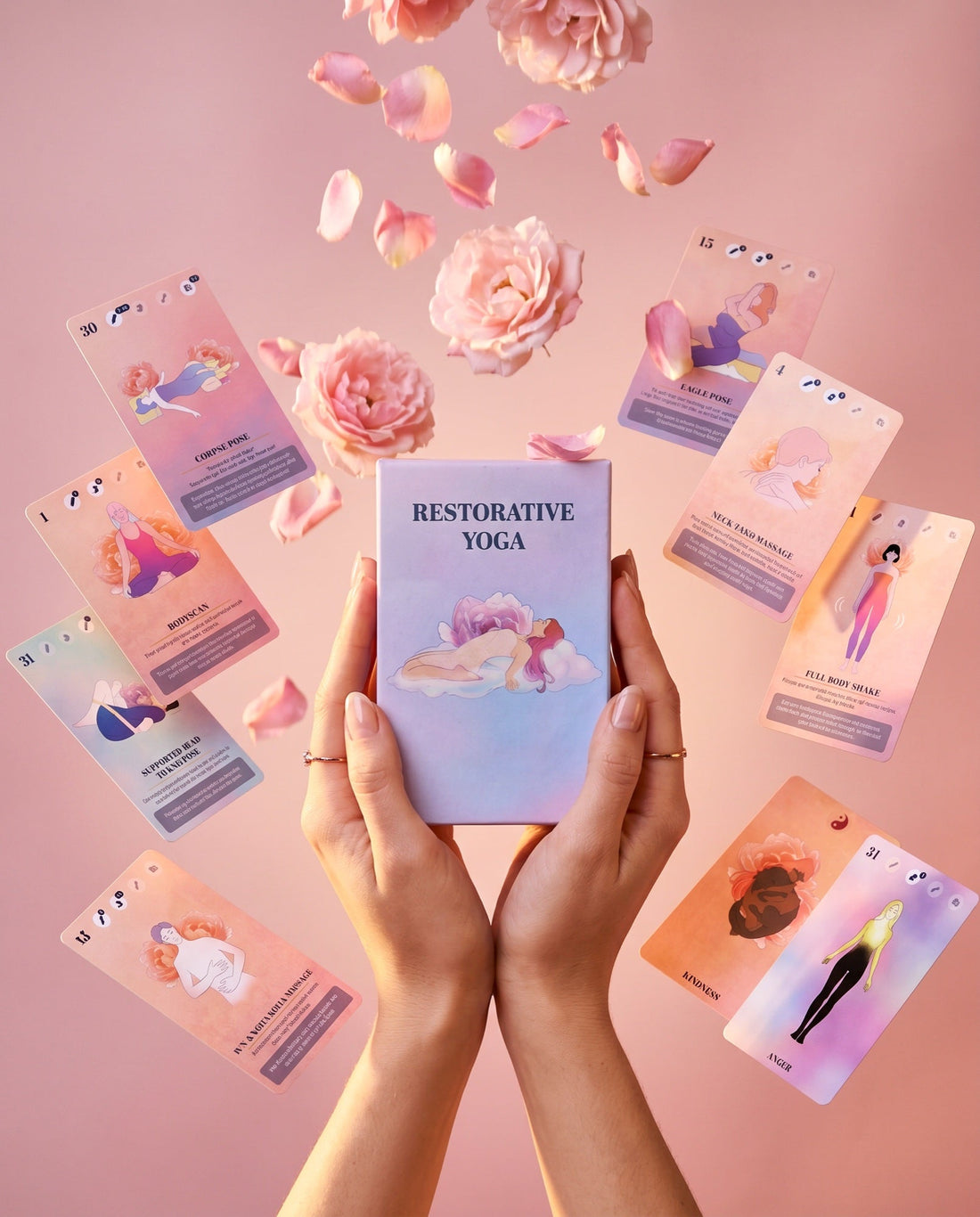 The deck held in both hands, cards fanned around it