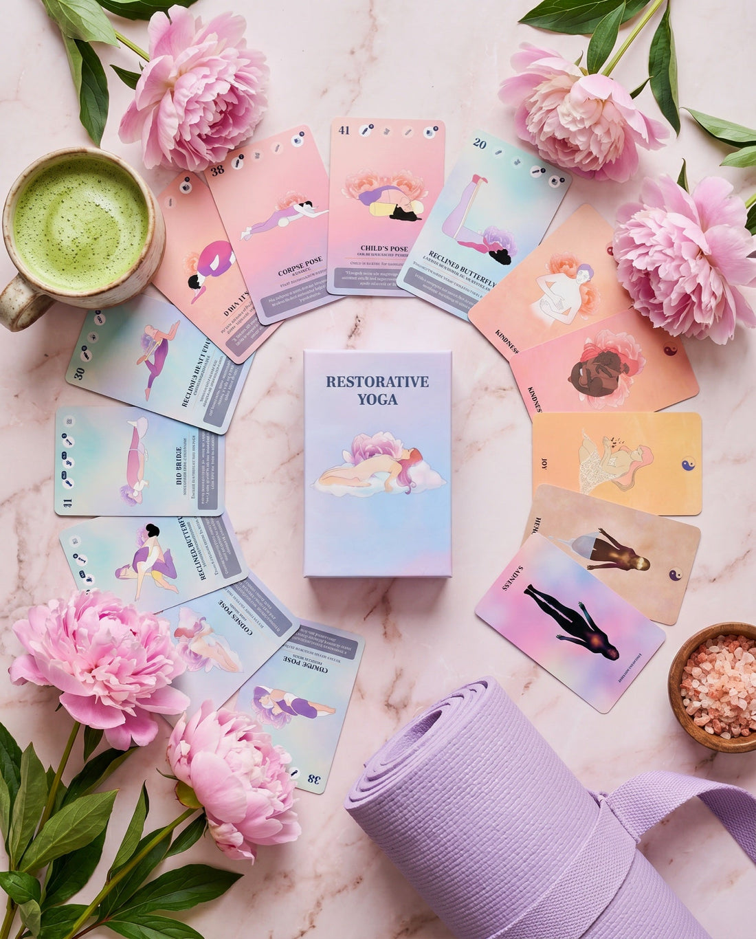 The deck and cards laid out with a mat, matcha and peonies